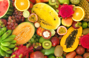 Collection of tropical fruits. Some sliced